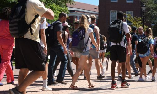 group of college students walking to class