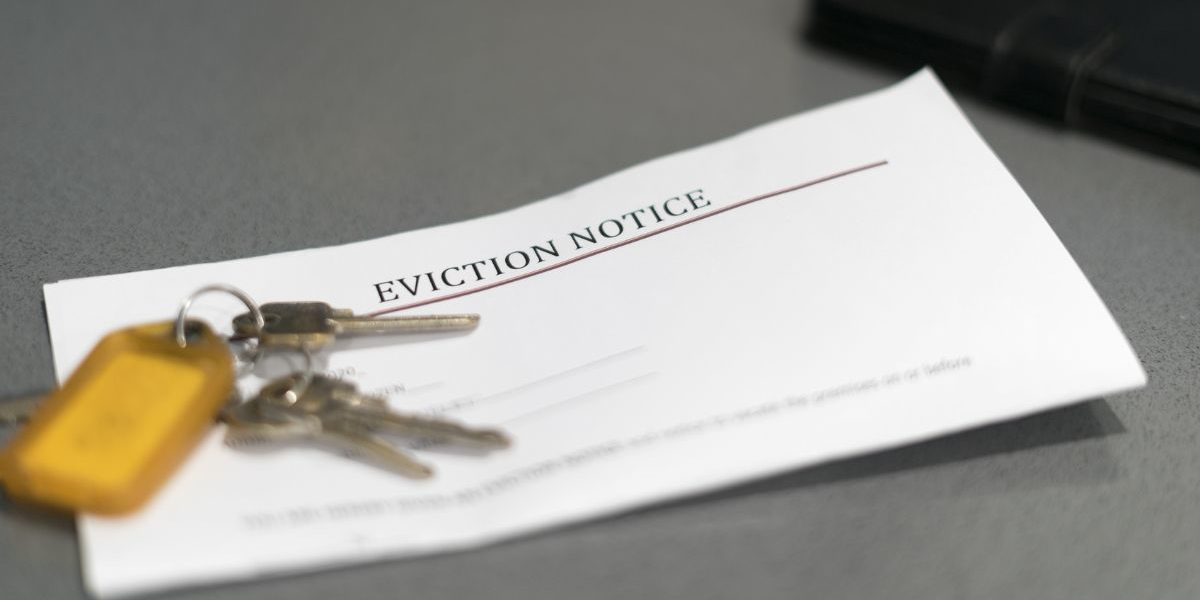 eviction notice with keys laying on top